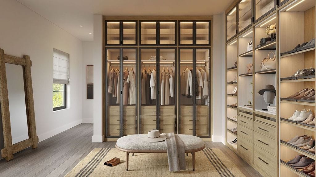 Walk in wardrobe closet with custom shelving with LED lighting by California Closets